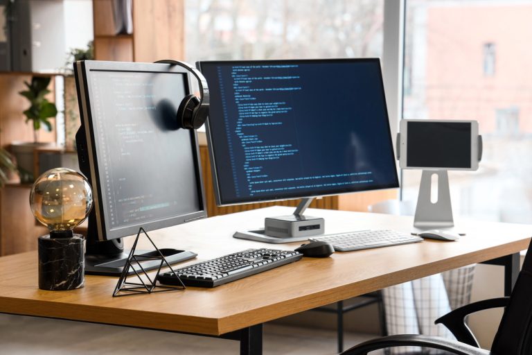 office with lms coding on monitors
